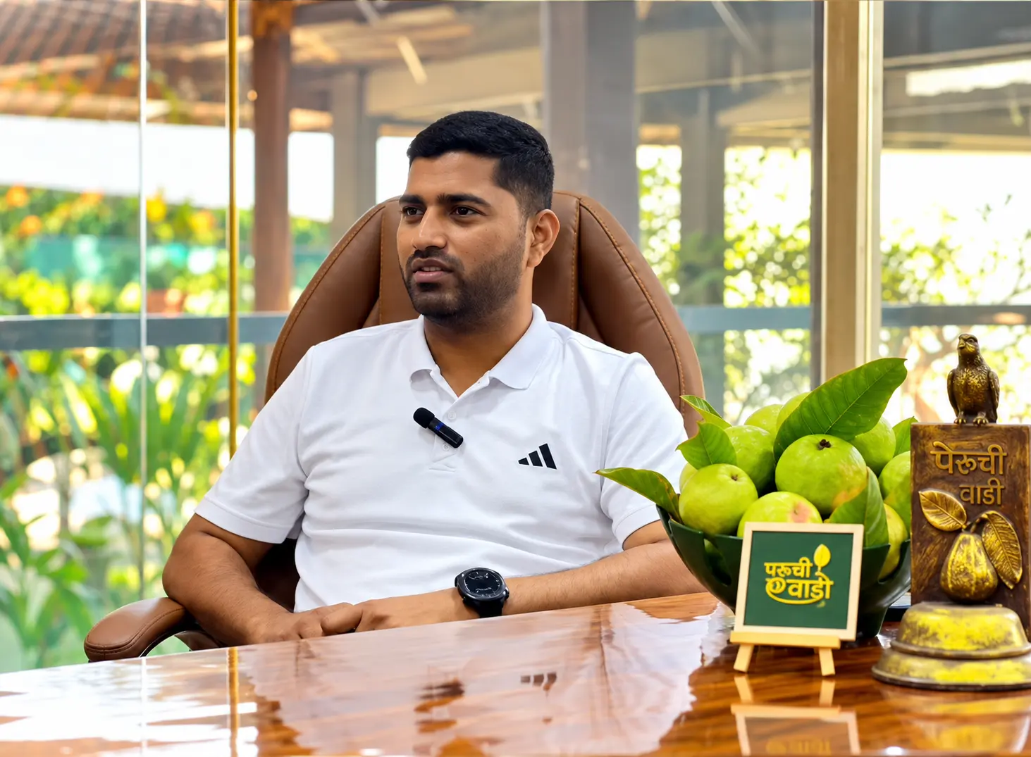 Interview setting with guavas on the table